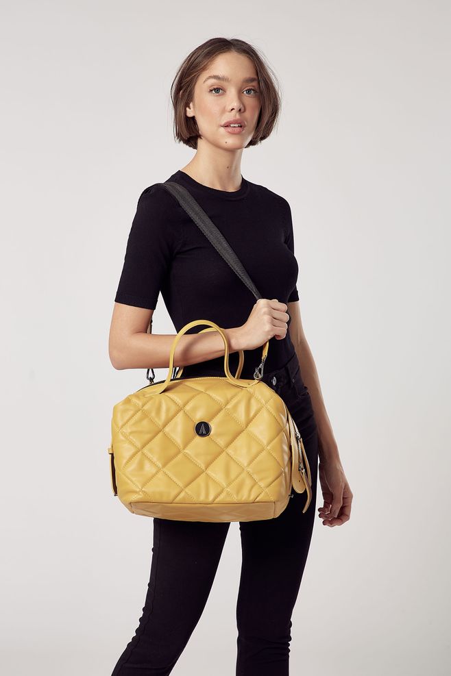 10 modelos de bolsos elegantes y fáciles de combinar con el look